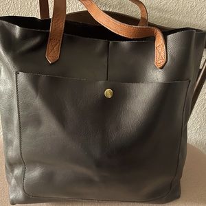 Black tote with brown straps